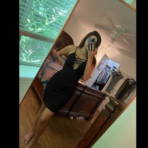 Little Black Dress. LBD. Bodycon Black Dress. Cross chest detail.